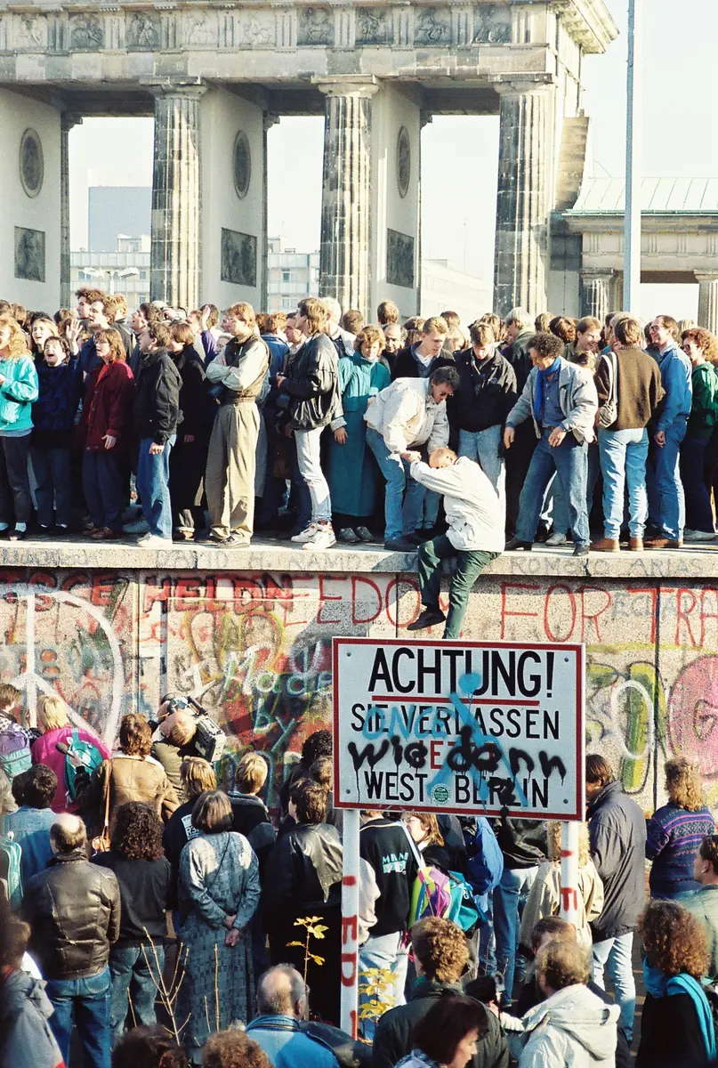 The Berlin Wall falls
